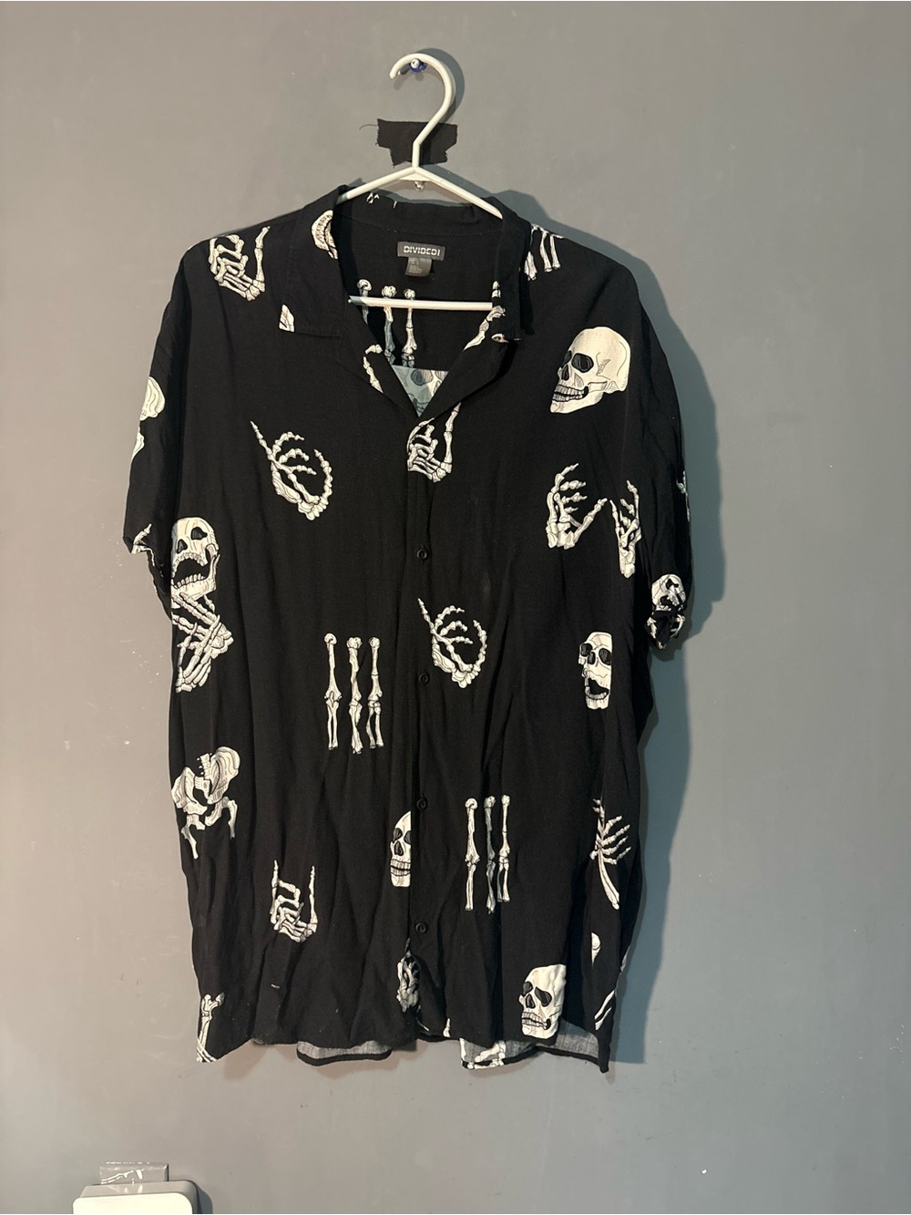 Black Short-Sleeve Button-Down Shirt with White Skull Print